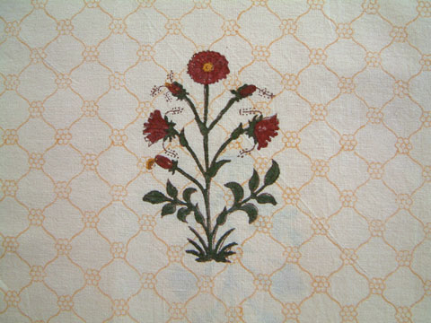 Red and cream fabric swatch