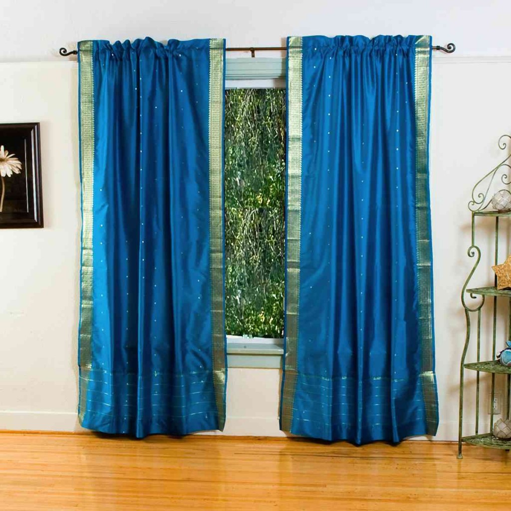 Turquoise silk sari drapes