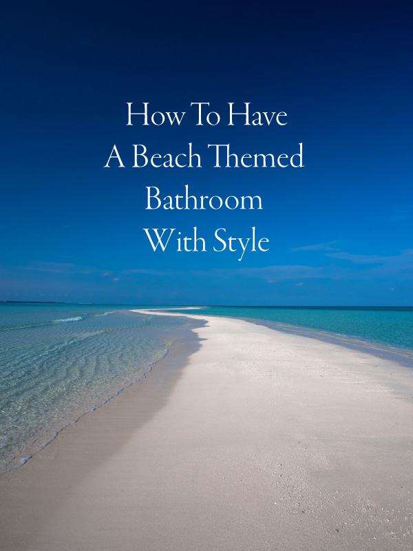 picture of beach with sign that says How To Have A Beach Themed Bathroom With Style