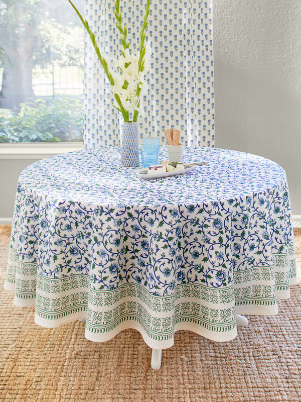 coastal Christmas with a blue and white and green Christmas tablecloth