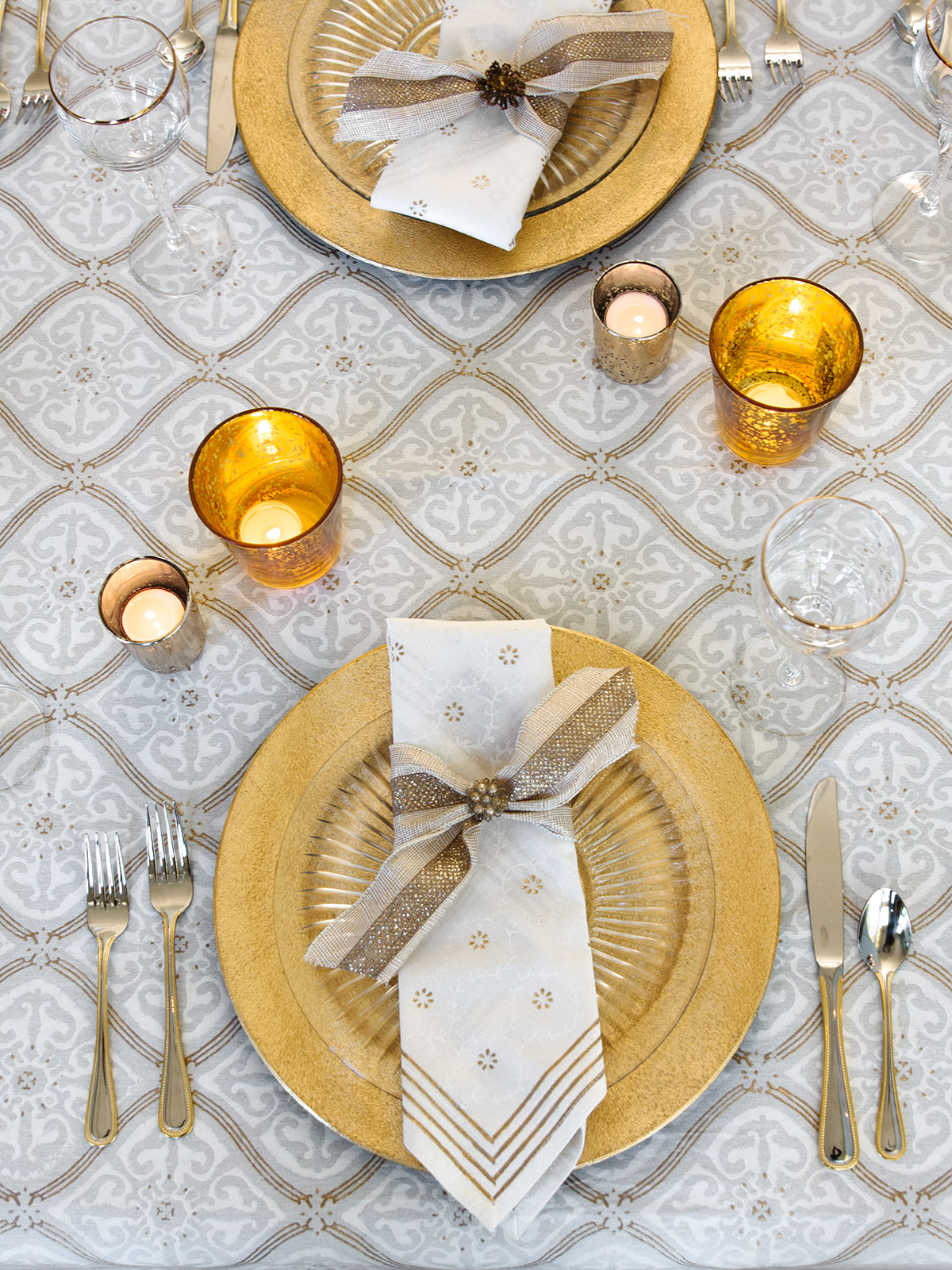 white and gold table linens for a winter wonderland theme