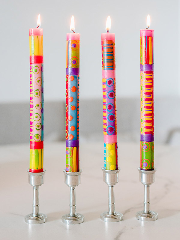 Set of four hand painted taper candles