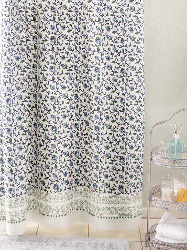 white and blue floral fabric shower curtain 