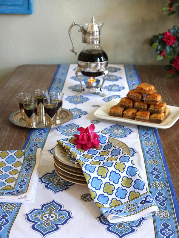 white and blue table runner in a Moroccan pattern