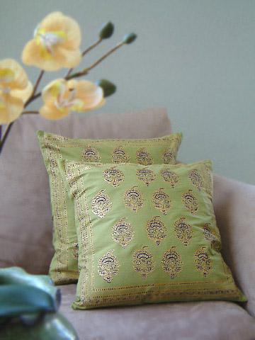 green boho pillow on chair, block print pillow