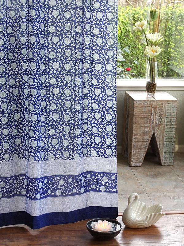 Blue floral curtains bring a tropical vibe to summer decor.