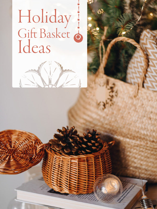 holiday gift basket ideas banner over a gift basket, pinecones, and candles