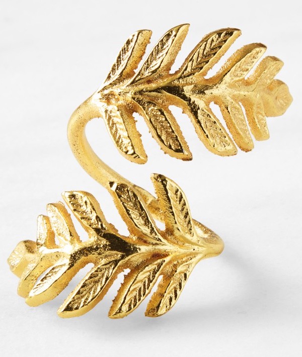 Gold napkin ring to go with an elegant christmas table runner and napkins