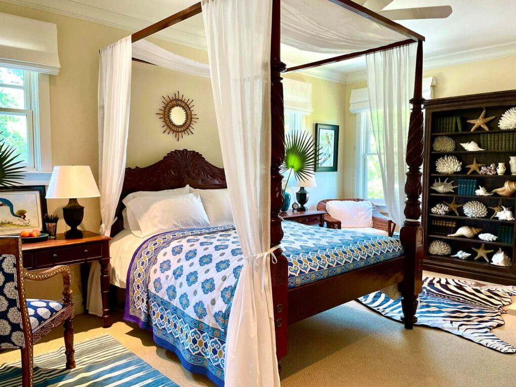 global chic room with moroccan decor and blue and white bedding
