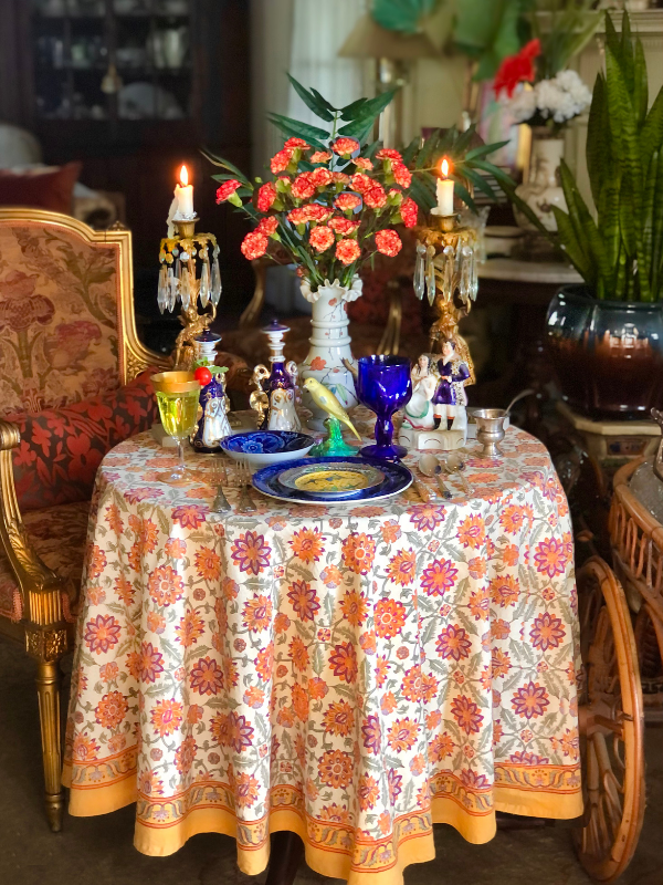 orange floral tablecloth with boho and global style