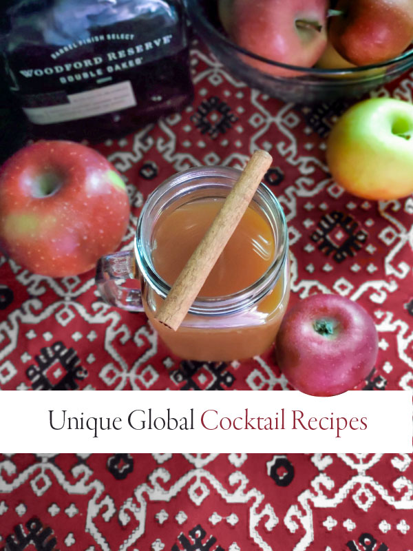 apples and spiked cider with banner that says Unique Global Cocktail Recipes