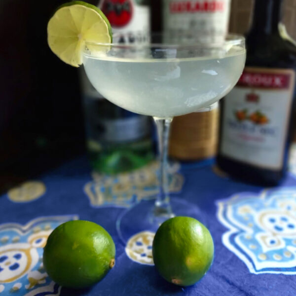 a holiday cocktail on blue linens