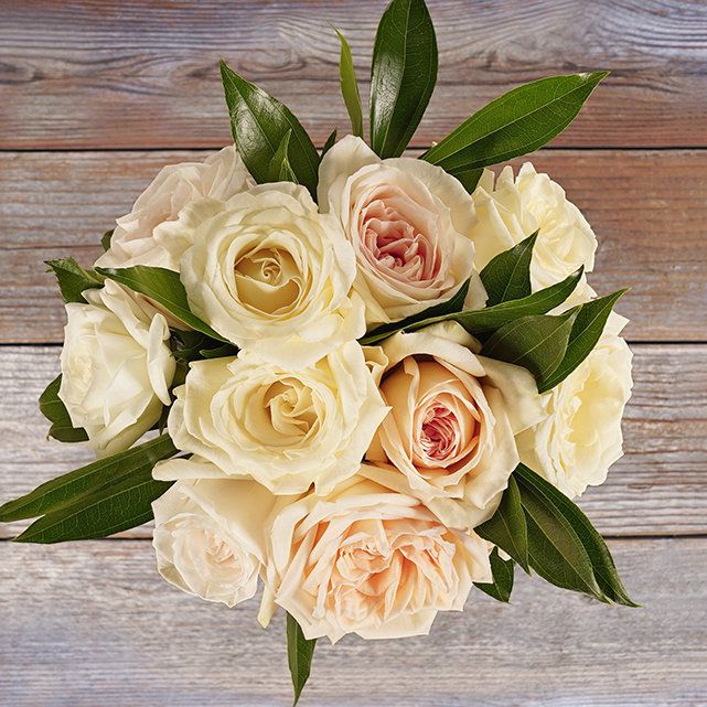 cream and peach rose bouquet as Valentine's table decoration from Bouqs Co.