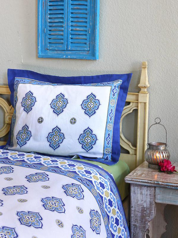 blue and white duvet cover with Moroccan pattern