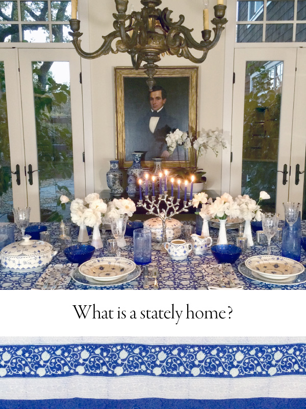 Photograph of a grand table setting with overlaid text that reads "What is a stately home?"