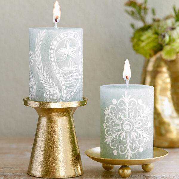 Sage Paisley pillar candles on golden candle holders