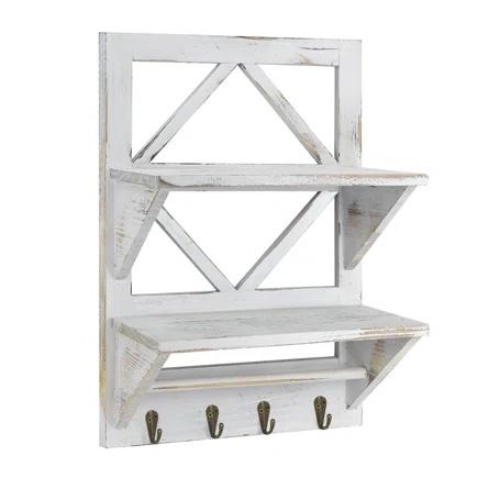 A distressed white shelf for the bathroom with two tiers and a row of hooks at the bottom