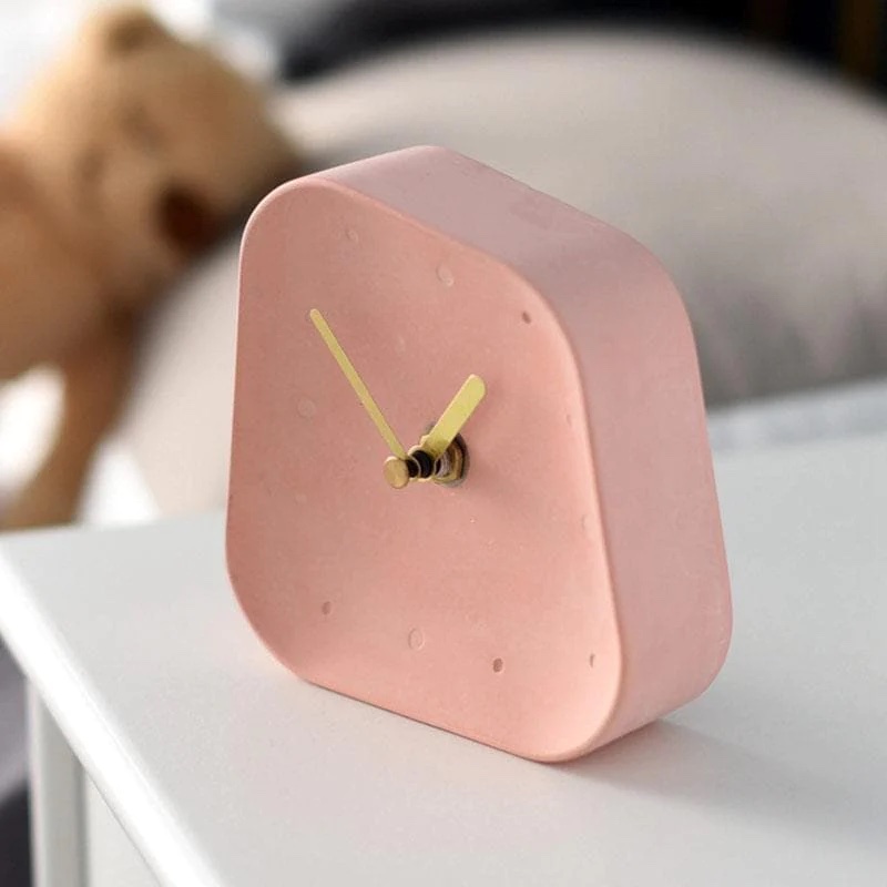 Minimalist desk clock made of pink concrete