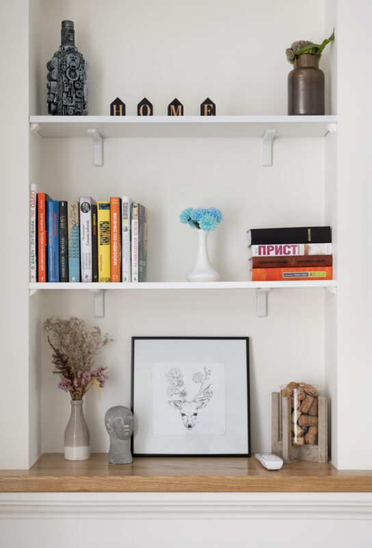 Photograph of a modern wall shelf with modern wall shelf decor