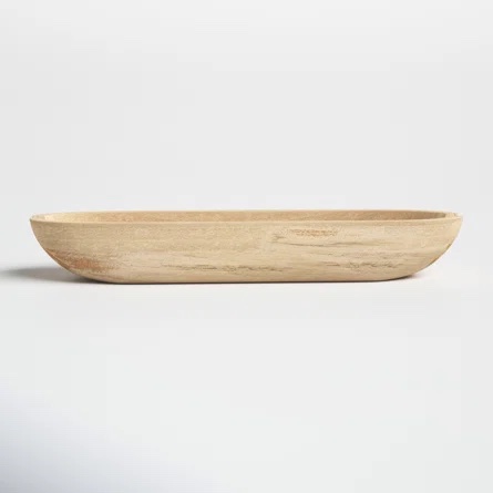 A narrow wooden tray