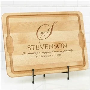 Decorative cutting board with wood engraving of the family name "Stevenson"