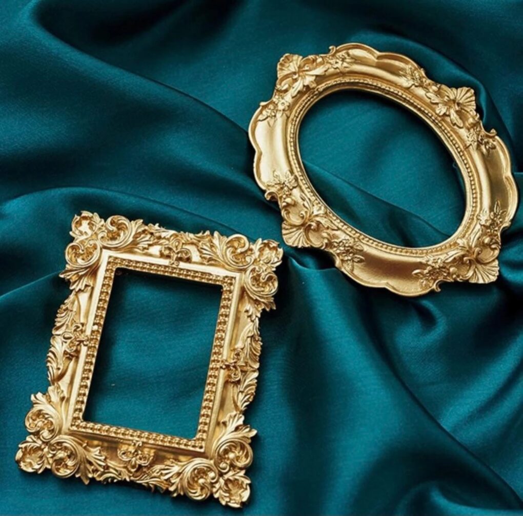Two gilded vintage style picture frames