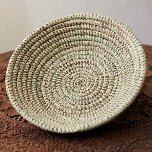 Empty, natural color woven african basket