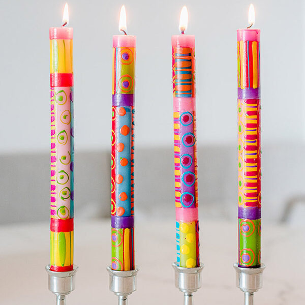 Set of four hand painted taper candles