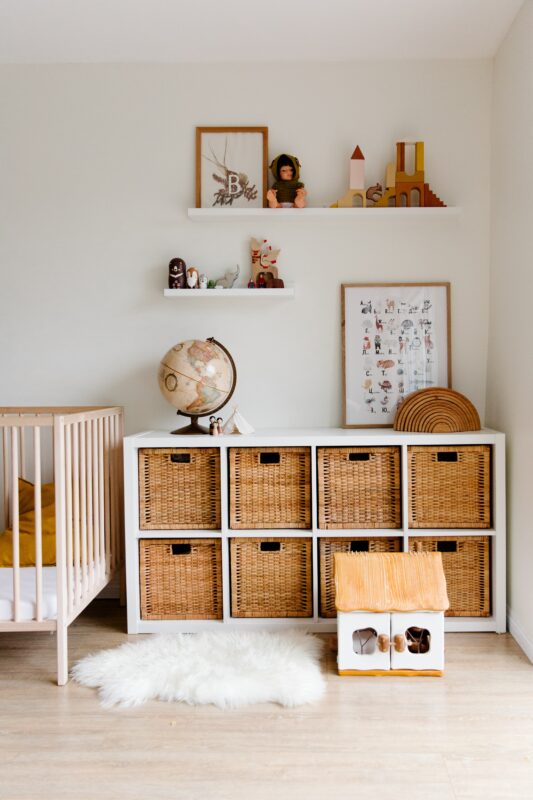 Example of nursery that followed ways to declutter the home using cubbies and smart storage