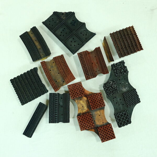 Image of wooden blocks used to print our Christmas fabric collection