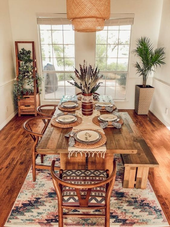 Modern bohemian style dining room using wooden furniture and nature-inspired decor