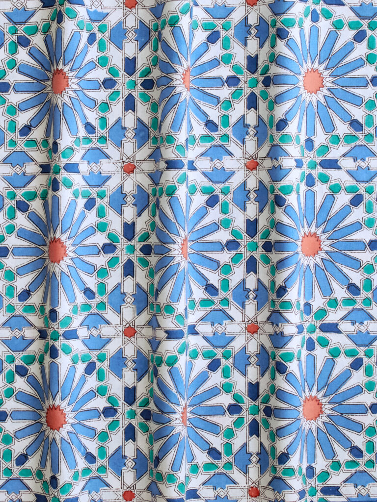 Modern boho pattern using Moroccan starburst motif and an earthy palette