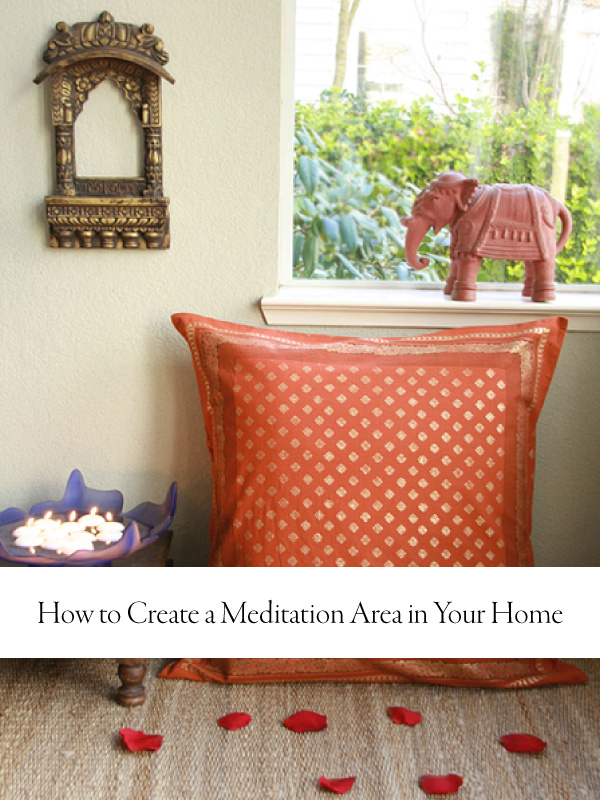 Blog featured image with overlaid text that reads "How to Create a Meditation Area in Your Home" featuring mindful decor such as tea candles and soft textiles