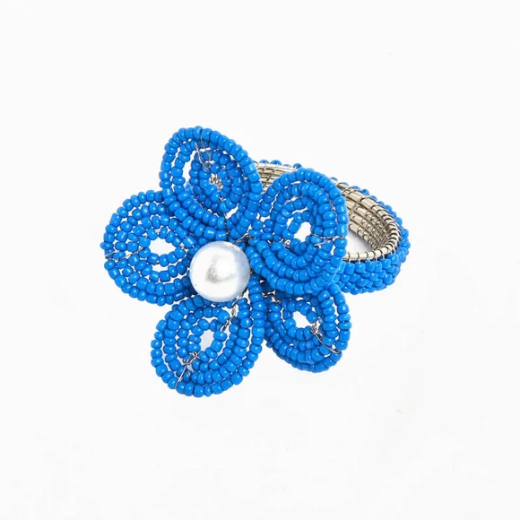 Example of a beaded napkin ring featuring a floral design made of blue beads