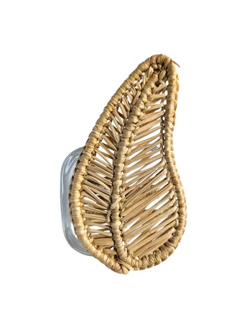 Photograph of woven napkin ring in the shape of a leaf