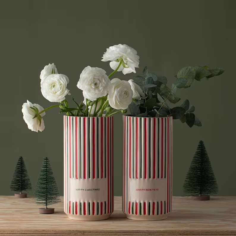 Photograph of ceramic planters demonstrating the idea of how to refresh a guest room with holiday themed vases