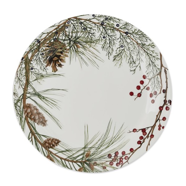 Winter christmas table decor with evergreen and pine plate