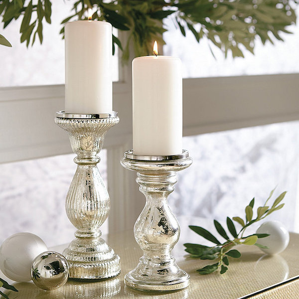 Winter christmas table setting with mercury glass candle holders
