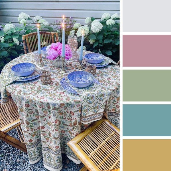 Photograph of a floral pastel table setting to demonstrate when is wedding season for the spring months and how to decorate for it