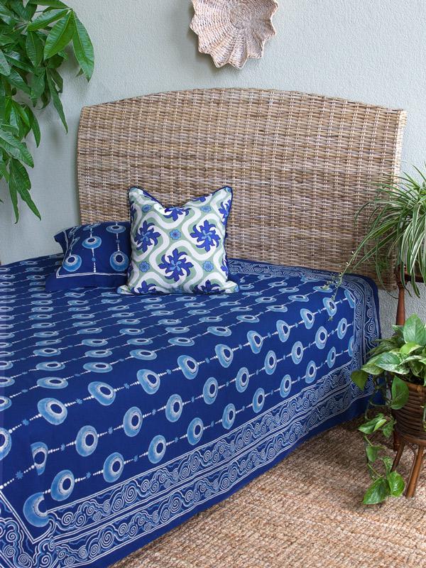 coastal bedspread in dark blue with tropical boho pattern
