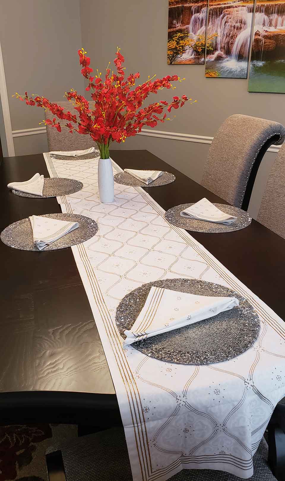 elegant gold and white table runner with centerpiece